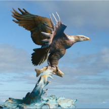 bald eagle, flying, bronze castings sculpture image piece figurine bald eagle catching fish salmon clark bronson 