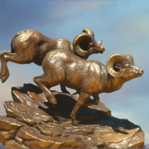 Down Windswept Peaks $6,995 13" H X 15"W clark bronson, wildlife statues, sculpture, bronze, figures, castings, bronze, pieces, figurine, rocky mountain bighorn sheep, rams, bighorn sheep, running down, Rams, full curl